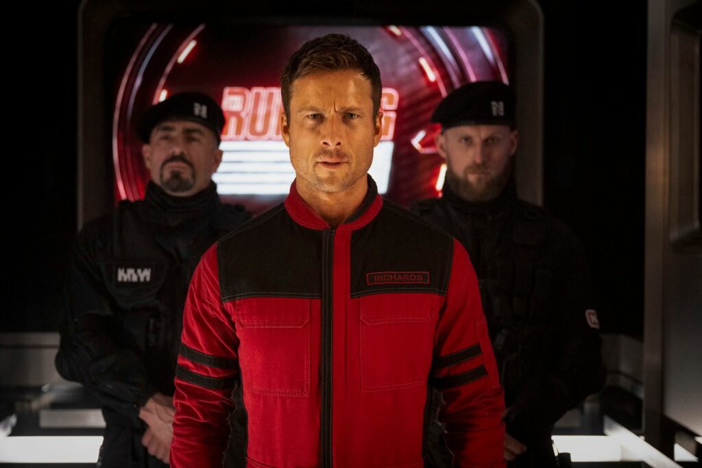 Glen Powell dans Running Man